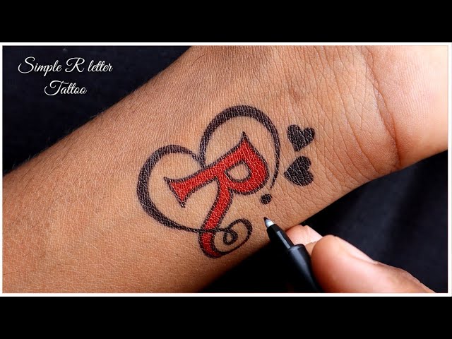 How to make beautiful R letter tattoo at home with pen |simple r letter  tattoo دیدئو dideo